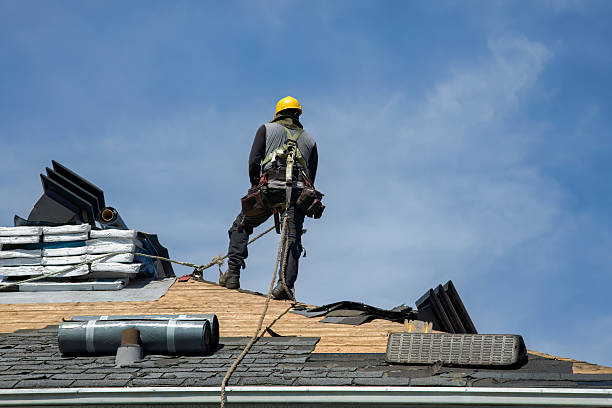 Professional Roof Replacement technician working in Rego Park, NY